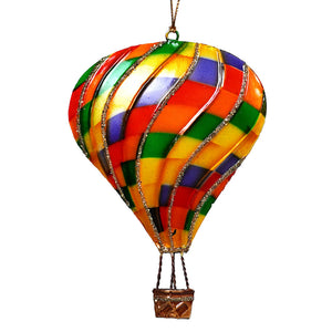 Tin multi color checkered hot air balloon ornament with glossy finish and glittery gold trim resembling a glass peacock hot air balloon ornament