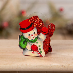 Cheerful red-hatted tin snowman bucket small with green scarf and candy cane perfect for christmas buckets and lanterns