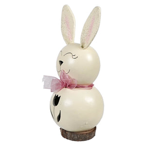 Cream-colored wooden tiny poppy bunny gourd with glittery pink ears and mauve ribbon bow by meadowbrooke gourds