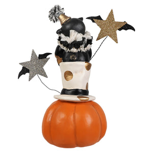 Top hat jack with cat features a black cat figurine with gold-tipped party hat on a polka dot top hat jack o lantern base