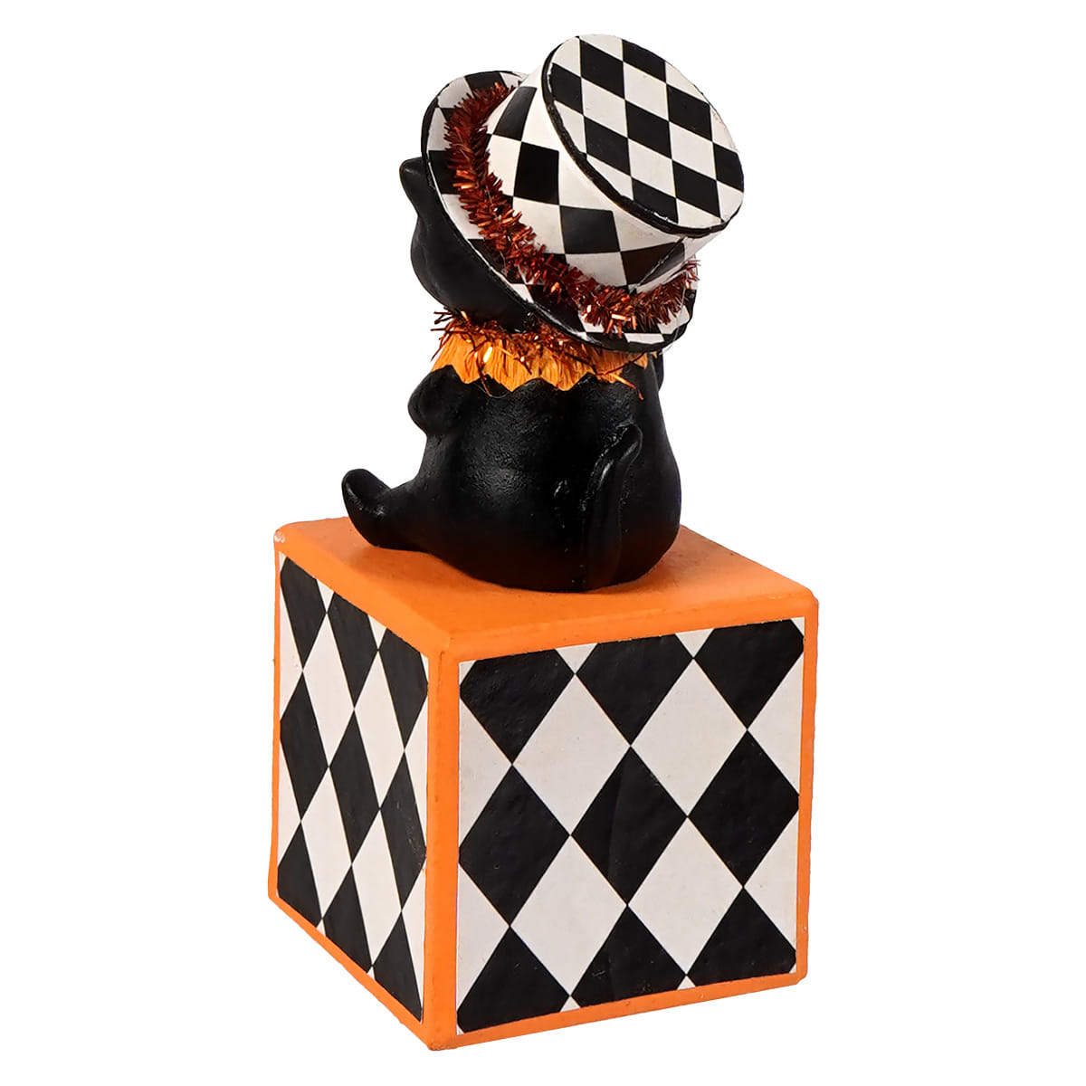 Black cat kitty boo figurine wearing a black-and-white checkered top hat with orange tinsel on an orange block base