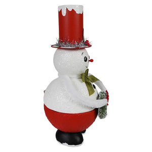 A festive glittery white snowman with a red top hat and green bow tie holding a pine branch christmas snowman decor