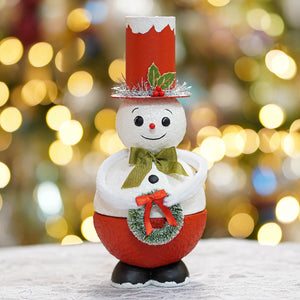 A festive red and white top hat snowman container with glittery hat green bow tie and orange ribbon wreath perfect for christmas snowman figures and decor