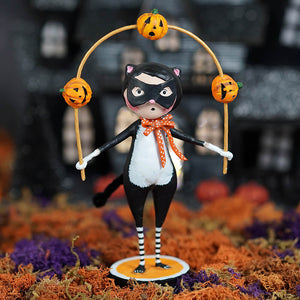 Black and white lori mitchell halloween cat figurine balancing jack o lanterns with orange bow tie and striped socks