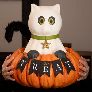 White cat-shaped pumpkin decoration trick or treat casper with green collar gold star and black feathered tail for halloween cats
