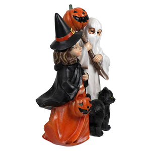 Halloween black cat figurines featuring a witch in black and orange with a ghost holding pumpkin and broomstick
