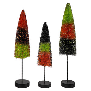Three glittery bottle brush trees in red green and black on metal stems from the tricks and treats black stripes delights set