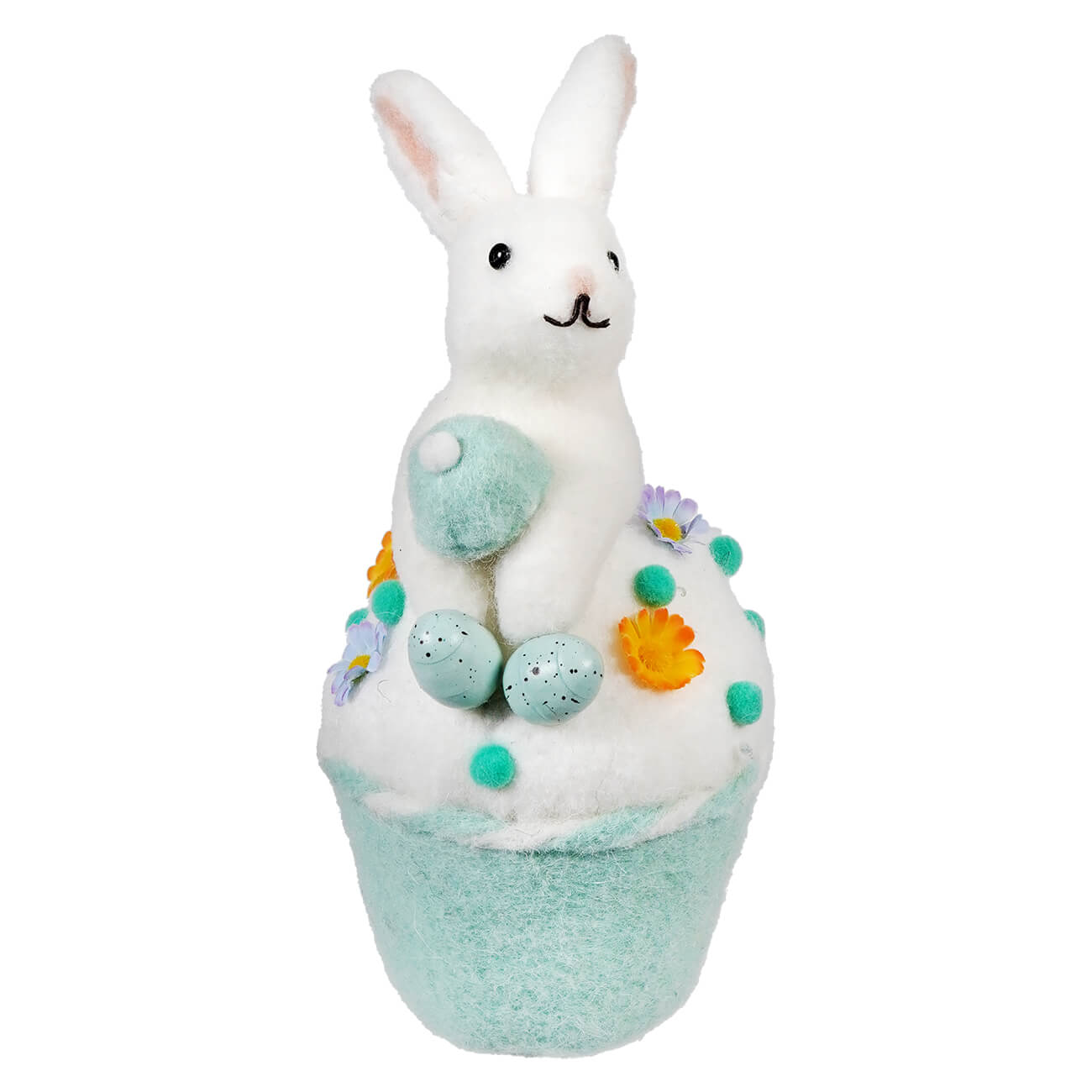 A bath bomb decorated with a white bunny, speckled eggs, and colorful flower accents.