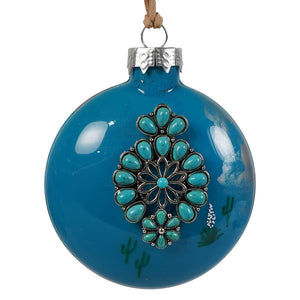 Vibrant turquoise handcrafted glass ornament with silver metalwork and teal stones in floral design perfect for christmas