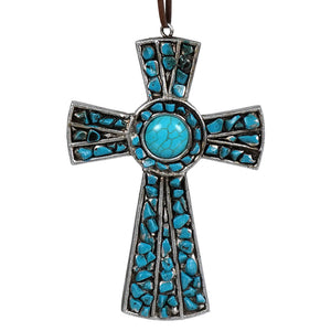 Turquoise cross ornament featuring a silver metal base studded with bright turquoise stones for a unique look