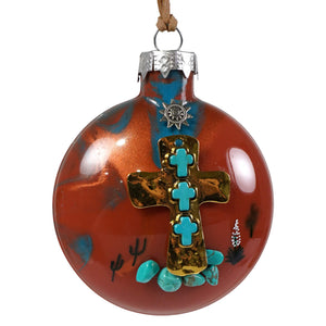 Turquoise cross ornament with rich copper-toned glass marbled in red and blue featuring a gold cross with turquoise stones