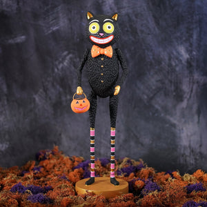 Crocheted black kook black cat with bright yellow eyes and orange bow tie holding a pumpkin lantern halloween cats decor