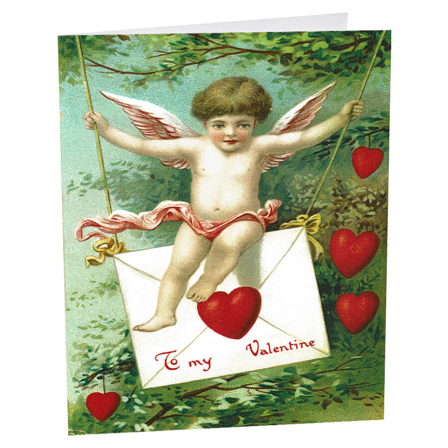 Cherub-like figure with wings sitting on a Valentine’s card envelope surrounded by heart shapes.