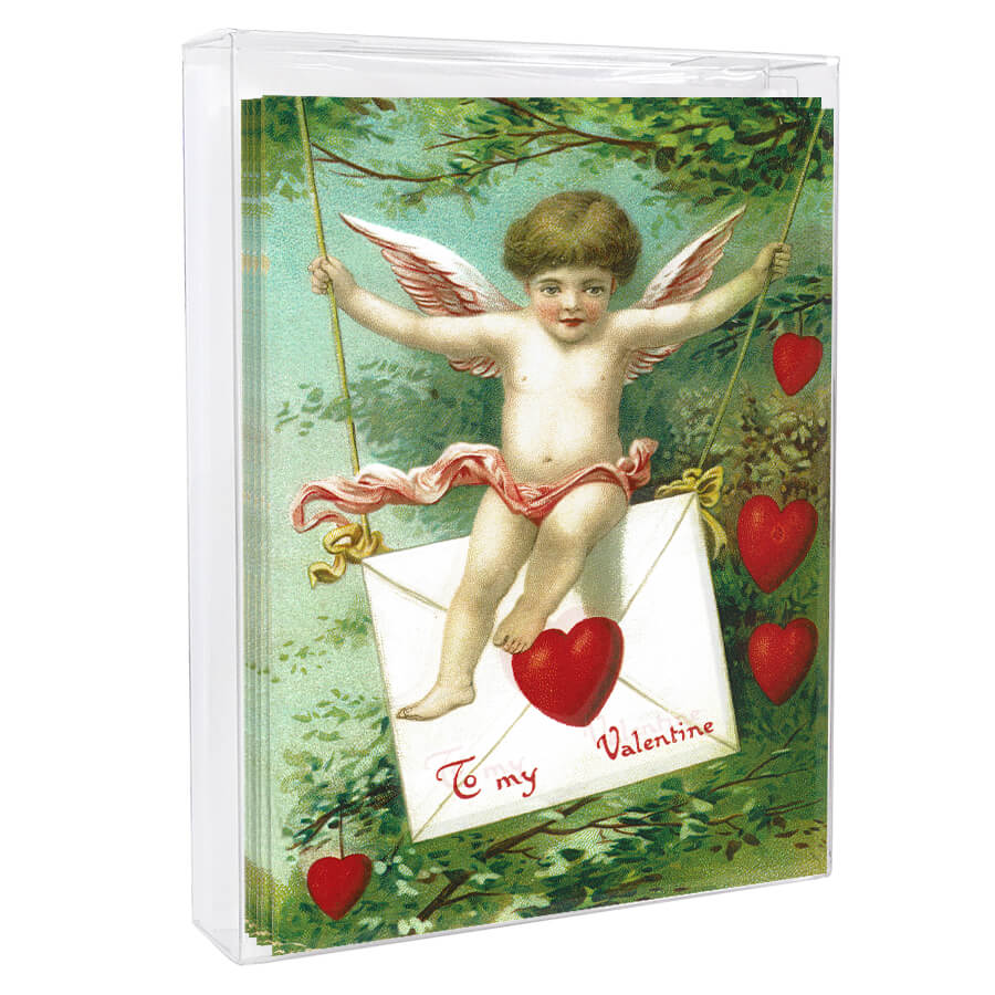 Cherub-like figure on a Valentine’s card with wings and heart decorations.