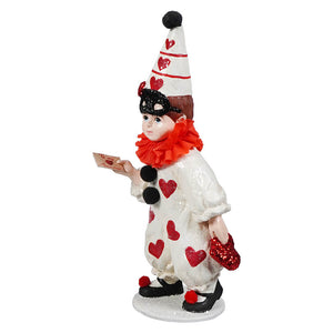 Valentine clown boy figural decor by bethany lowe is a white clown with red hearts black pom-poms and glittery red glove