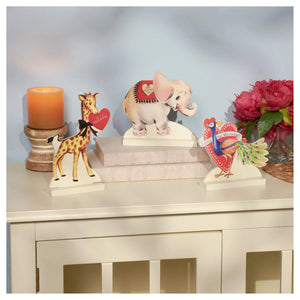 Valentines day figural decor stand up set featuring pastel and vibrant paper cutout giraffe elephant and peacock with hearts