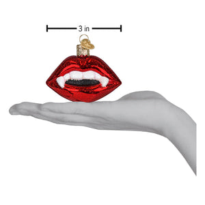 Vampire lips ornament red glass figural decor with white fangs black interior and gold hanging loop for lighted decor