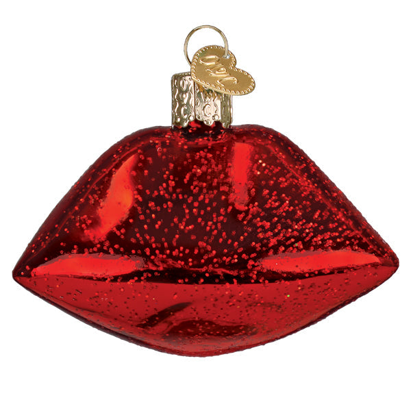 Shiny red glittery glass vampire lips ornament with gold heart tag perfect for figural decor and lighted decor