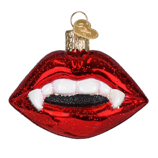Red glittery glass vampire lips ornament with white teeth black sparkly tongue and gold heart tag figural decor