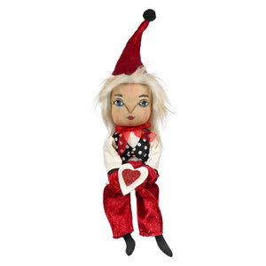 A whimsical vander valentine doll by joe spencer with white hair, red velvet jester hat, black polka-dot vest, and matching pants