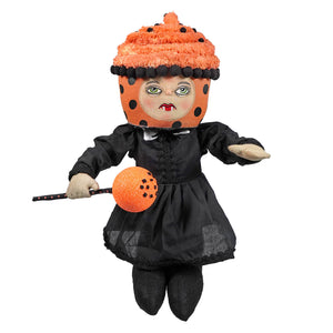 Orange polka-dotted cupcake-themed varna vampiress standing doll in black dress holding orange orb on stick vampiress standing doll