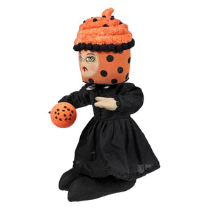 Varna vampiress standing doll in a black dress with orange polka-dot cupcake details on the skirt