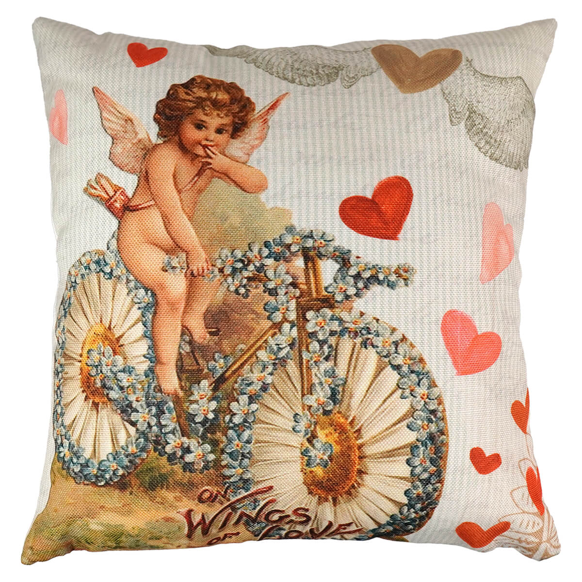 Vintage angel cushion with cherub riding a flower bicycle decorated with red and pink hearts on beige fabric