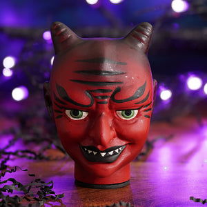 Vintage devil cachette glossy red devil mask with black markings green eyes and sharp white teeth