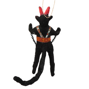 Vintage handcrafted cotton krampus ornament with black devil figure red horns patterned vest and orange belt hanging string