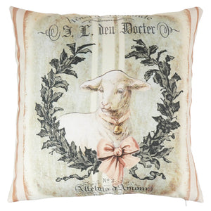Cream-colored wreath pillow with vintage lamb illustration, black script, and soft pink bow spreading holiday cheer