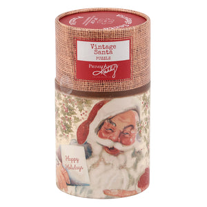 Vintage santa puzzle in a cylindrical container with burlap textured wrapping and festive holiday artwork