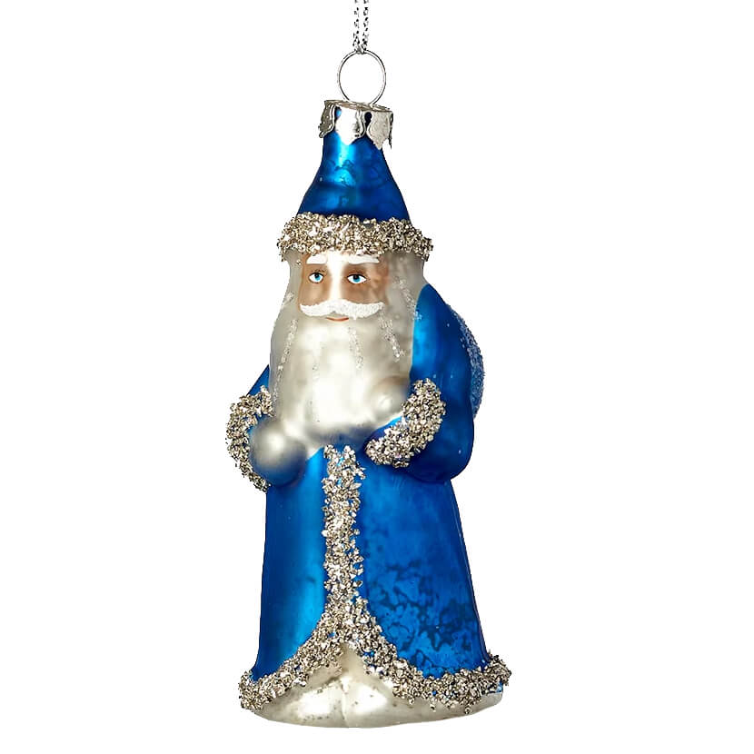 A vintage santa ornament made of blue glass with silver glitter trim perfect for christmas ornaments and santa ornaments