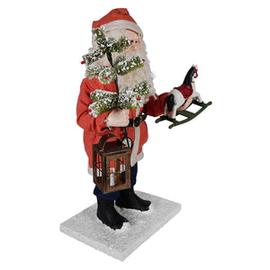 Vintage santa figurine by bethany lowe holding a lantern and rocking horse with snow-dusted tree branch