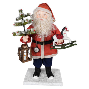 Vintage santa figurine with rocking horse, tree, and lantern featuring bethany lowe’s vintage holiday charm