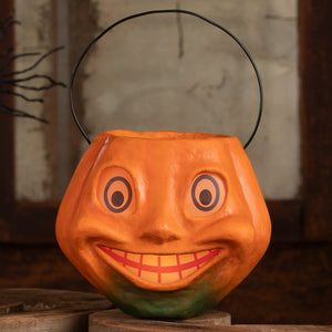 Vintage silly pumpkin bucket halloween bucket shaped like orange pumpkin with cheerful face and black wire handle