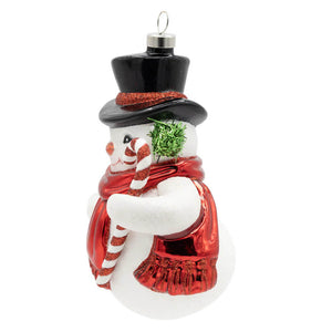 Vintage snowman ornament with black top hat red glitter scarf candy ornament holding green tinsel festive design