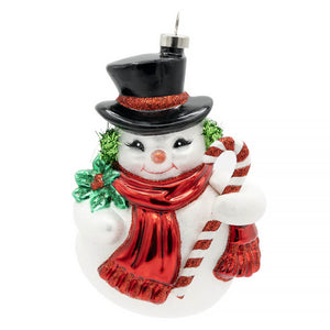 Vintage snowman ornament made of glossy glass wearing black top hat with red trim and holding candy ornament cane