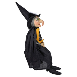 Viviana plush witch figurine with tall black hat gray hair and orange patterned bodice from joe spencer halloween dolls and decor