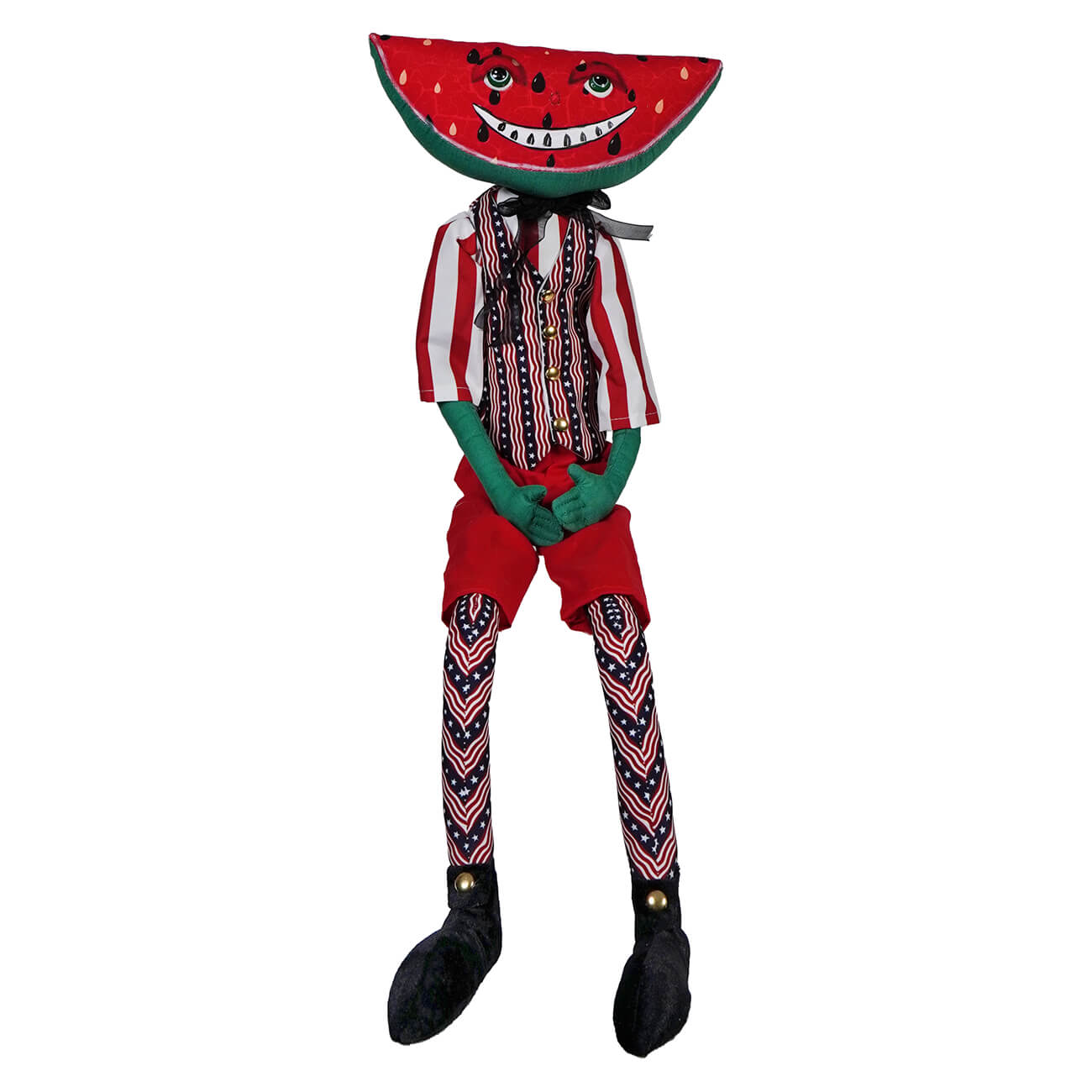 Whimsical cloth doll with a watermelon head wearing striped clothing and dangling legs.