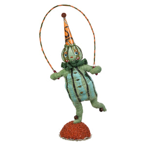 Handcrafted folk art scared pumpkin figure with green stripes and orange black hat made of paper mache spun cotton head