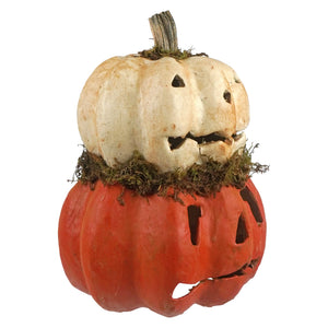 White and orange two layered carved pumpkin jack o lantern with mossy accents perfect for halloween pumpkins and gourds decor