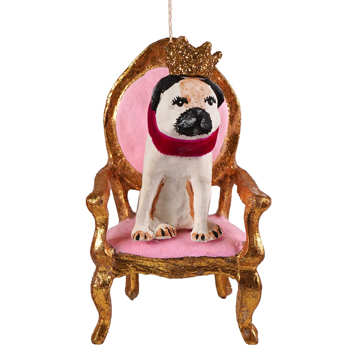 White regal pug figurine wearing red scarf sitting on plush gold chair with glittery crown farm ornament cody foster ornament