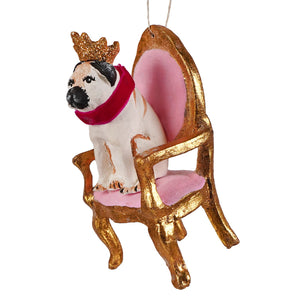 White regal pug sitting upon plush gold chair ornament with glittery crown and red velvet collar for cody foster ornament fans