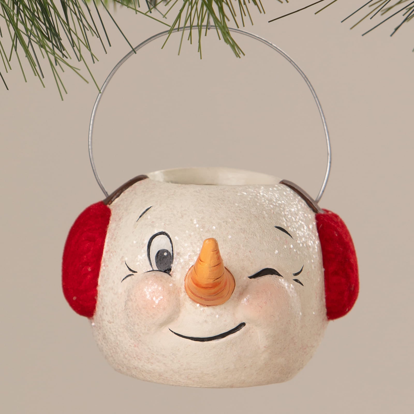 White glittery snowman bucket ornament with red earmuffs and carrot nose perfect for christmas buckets and lanterns