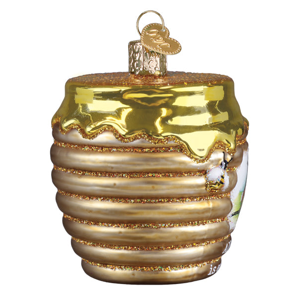 Winnie and friends honey pot christmas glass ornament with golden glass jar, glittery lid, honey drip, and bee figurine