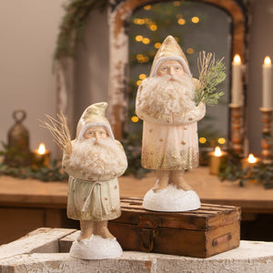 Two vintage-style winter blush belsnickle figurines with white beards gold glitter and snowy bases by bethany lowe designs