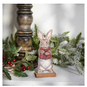 A charming paper-cut winter bunny stand up with a red vest on a wooden base vintage easter bunny figural decor