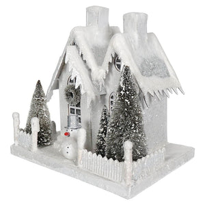 Winter White Cottage with Snowman at the Gate