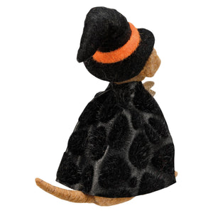 A plush mouse dressed as kathy’s dog witch in a black velvet cape and hat from kathy’s halloween collection