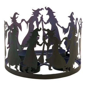 Black metal witches circle candle holder with cut-out witch silhouettes from kathys halloween collection seasonal candle holder